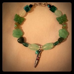 Turquoise bracelet w/ feather pendant